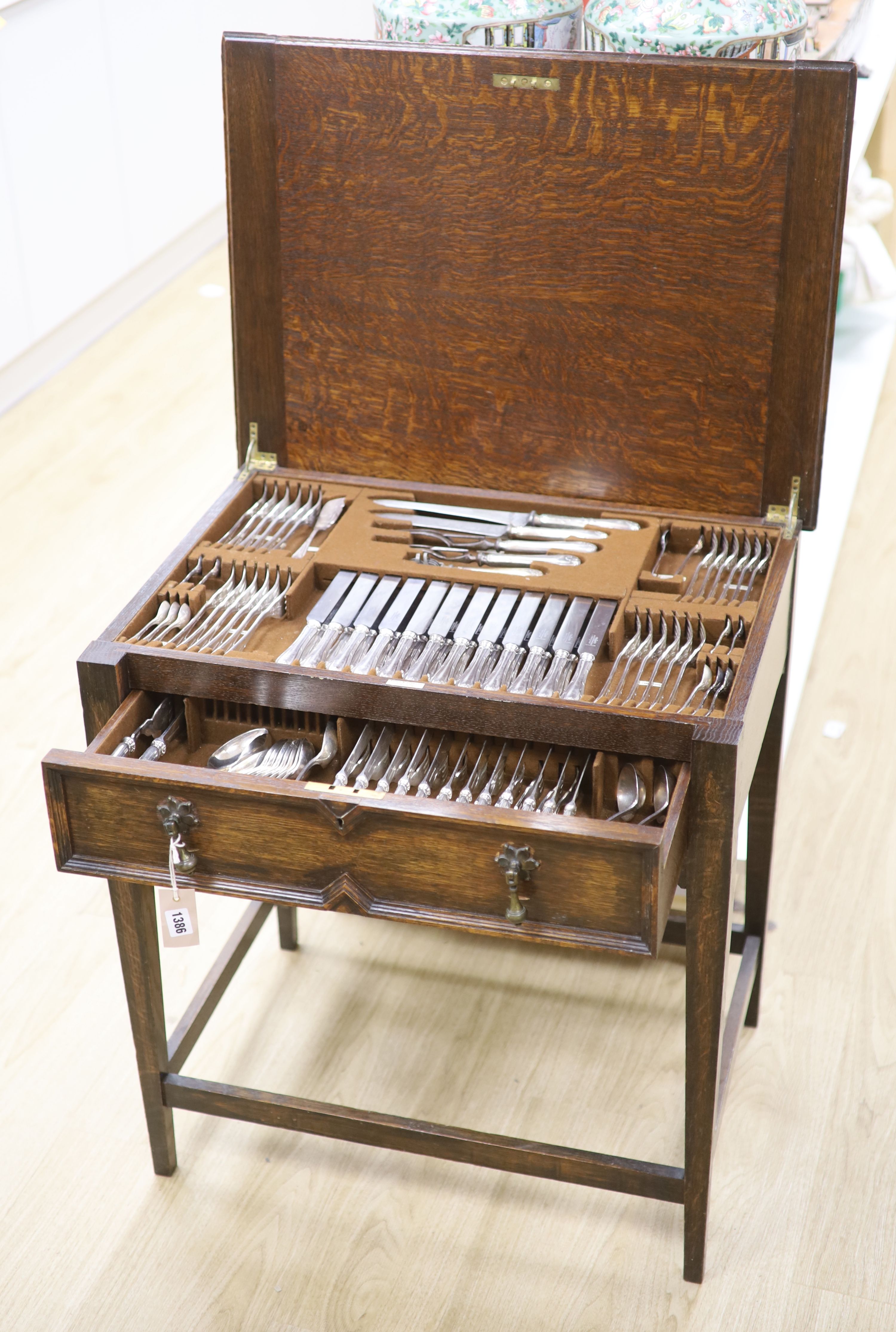 An early 20th century silver plated oak cased canteen (not complete)